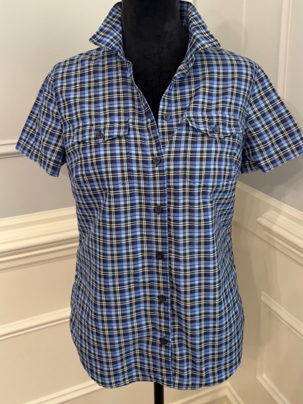 Eddie Bauer plaid shirt size small. Blue, white and black colors.